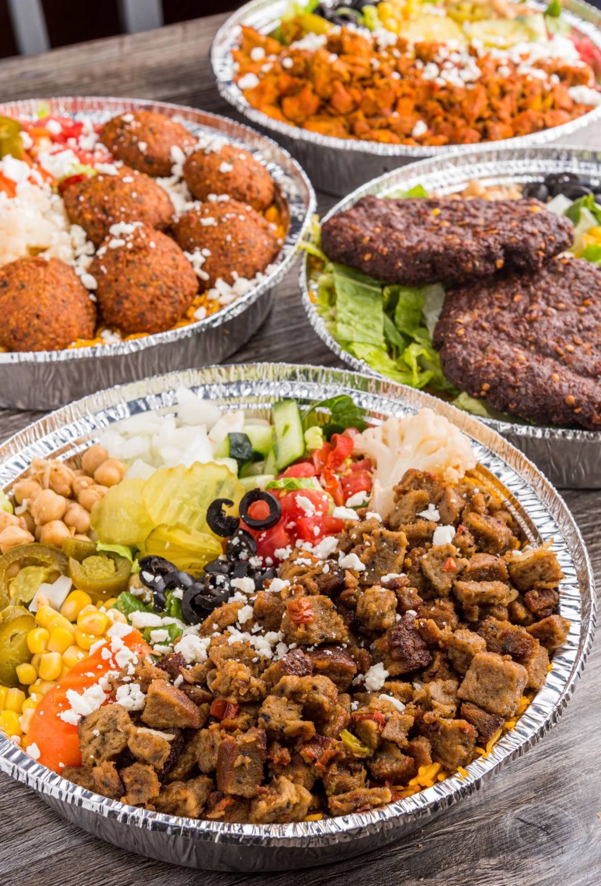 Gyro Hut platters — gyro, falafel, chicken and chapli kabab served over rice